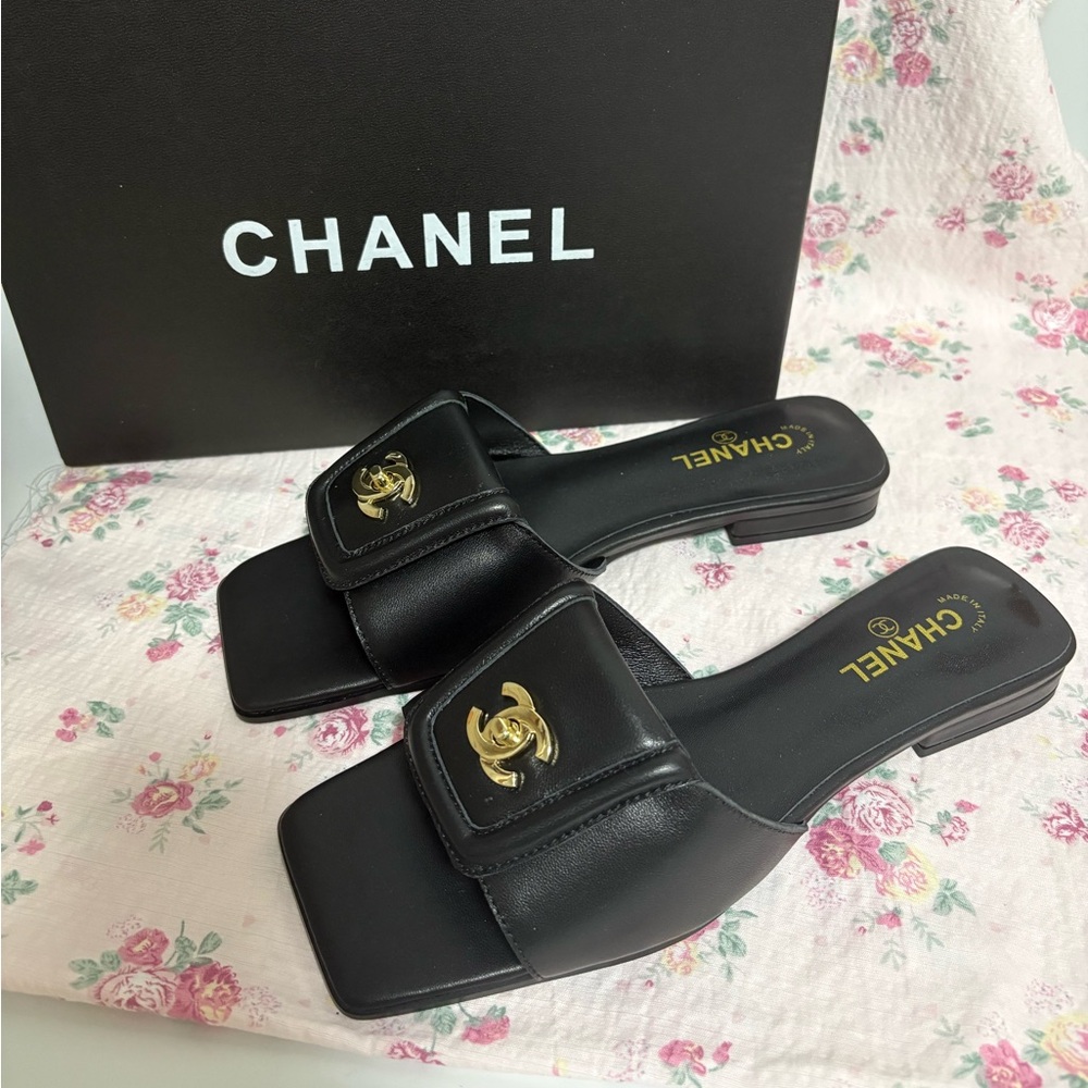 Chanel flat slide sandals.